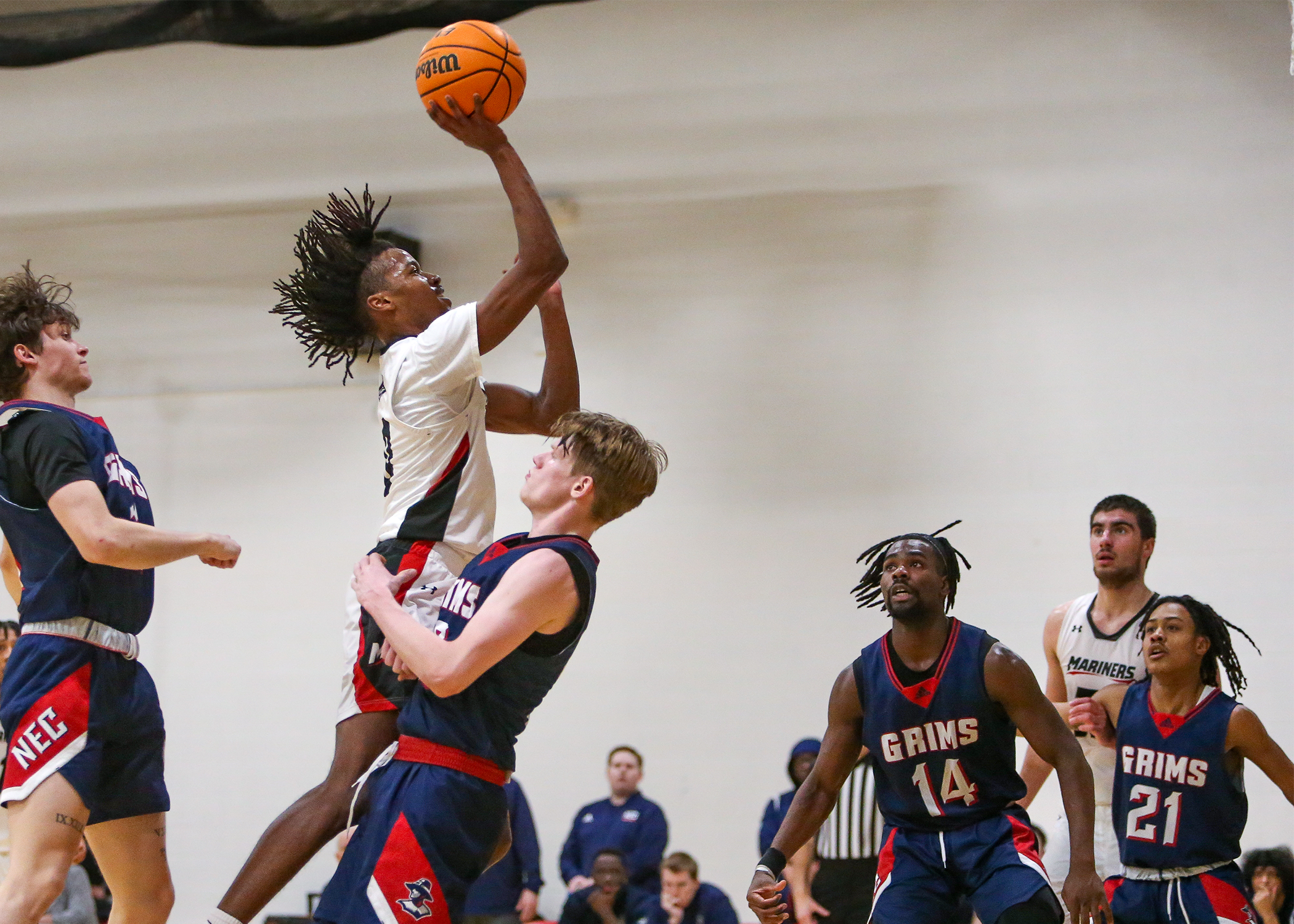 AMCATS Hold Off Men's Basketball