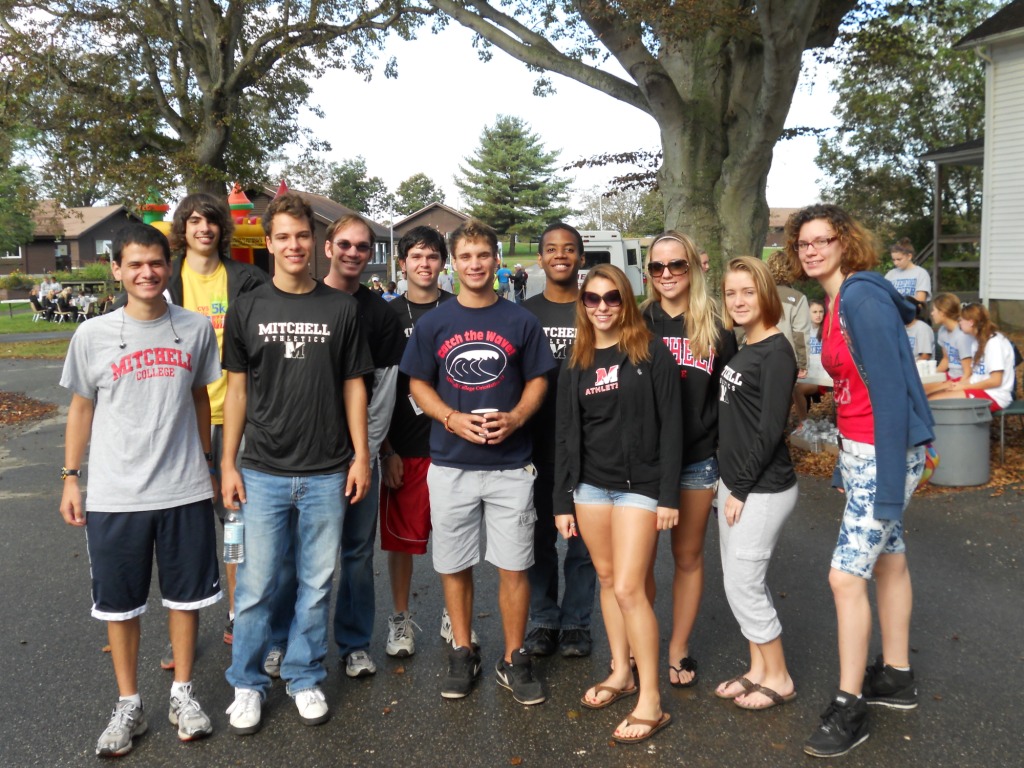 Serving the Community: XC at the Strides Road Race